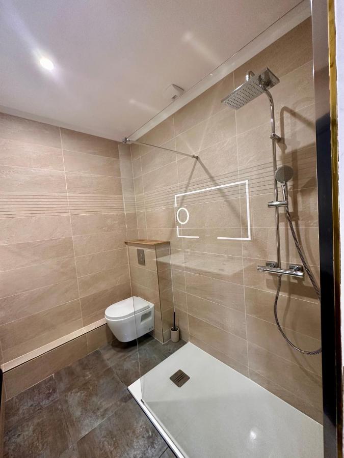 Les Appartements Du Palais การ์กาซอน ภายนอก รูปภาพ